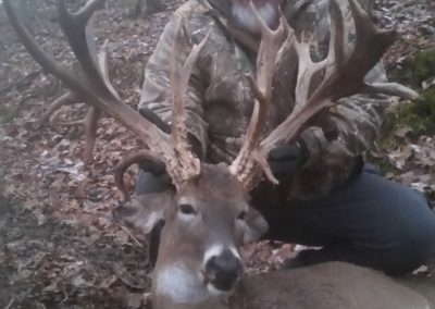 28 point buck with smiling white gotee man