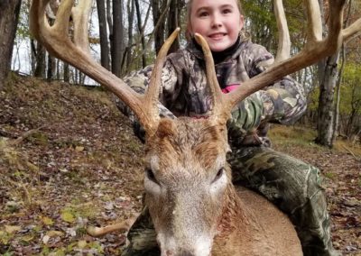 Little Girl with 14 point buck