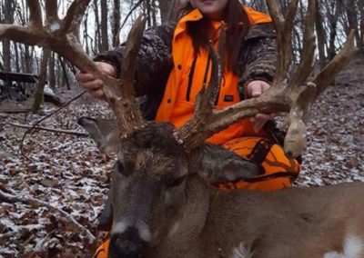 Young girl with glasses with huge buck